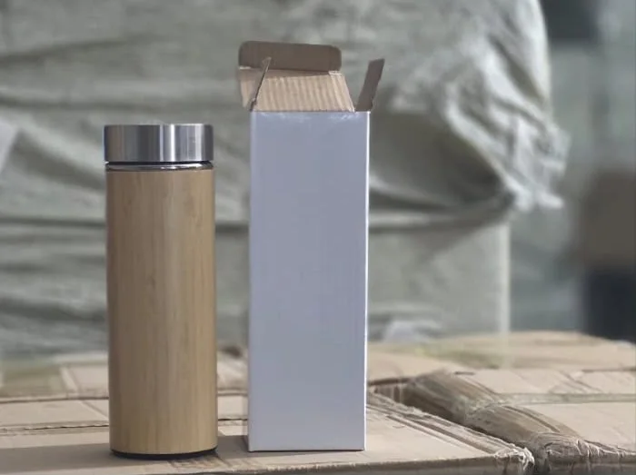 Bamboo flask with a steel lid